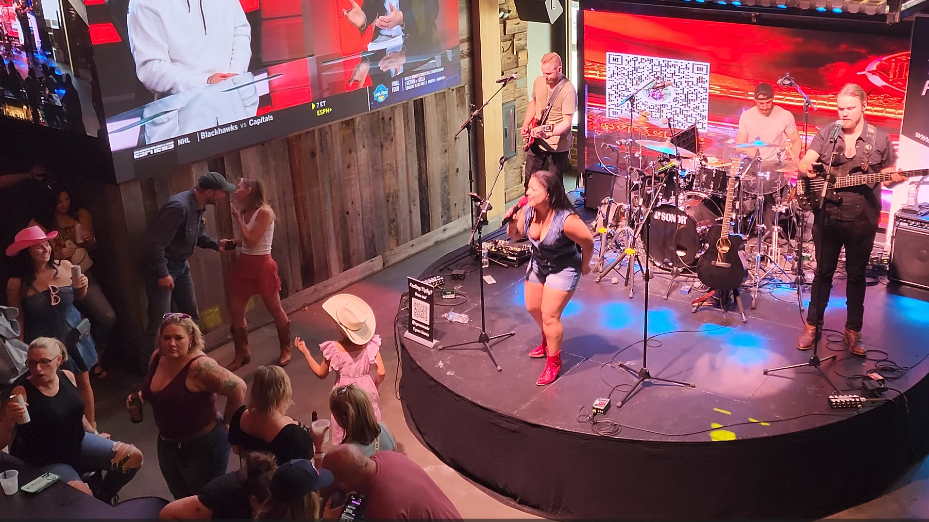 A full band performs inside a Lower Broadway bar.